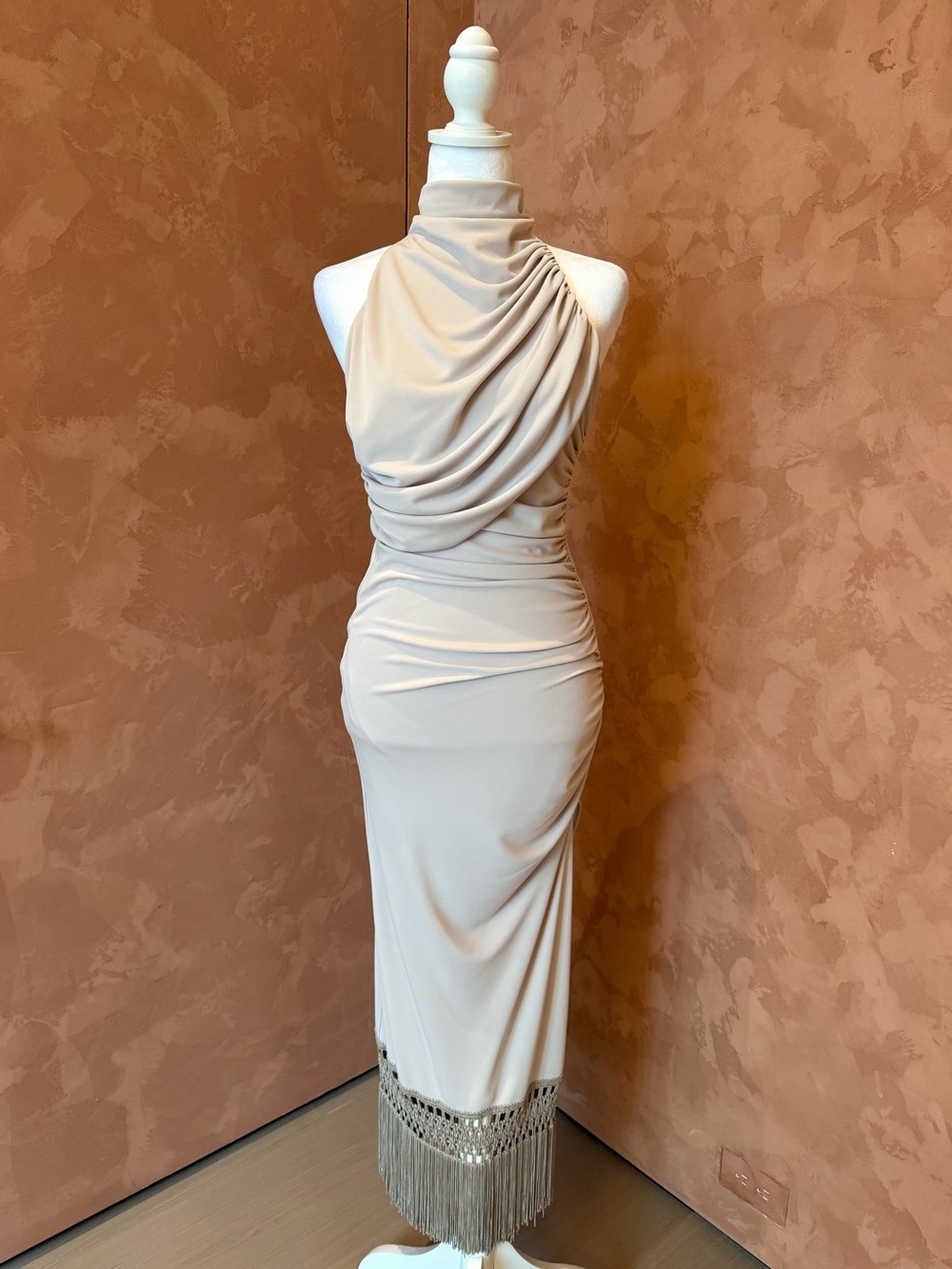 The Andamane Taupe Halter Neck Draped Backless Dress with Fringe